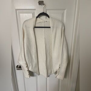 Cream cardigan with gold accents